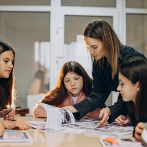 Teacher with students